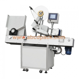 Horizontal vial rolling labeling machine