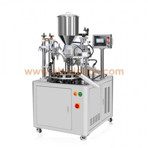 Tube filling and sealing machine